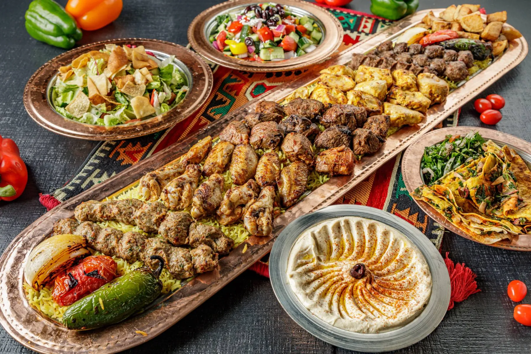 A mixed grill platter with kebabs, hummus, salads and mezze at Jerusalem Shawarma