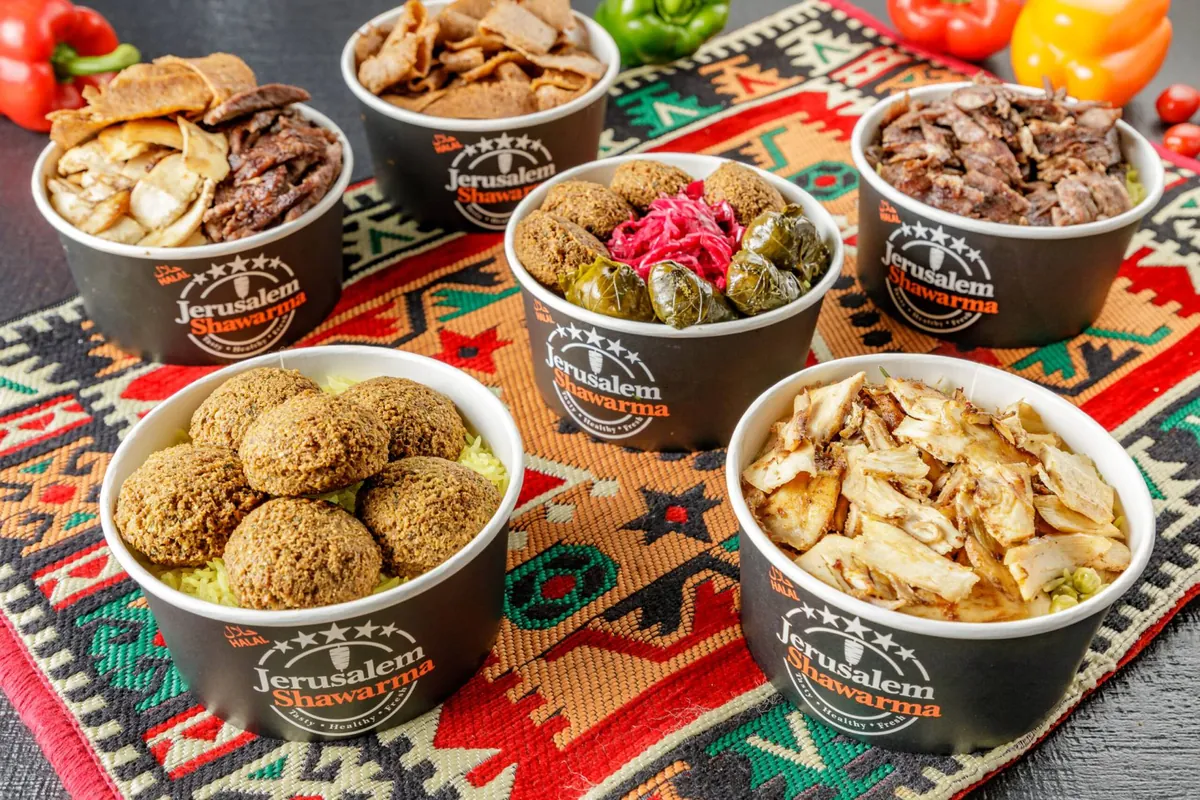 Take-out bowls of shawarma, falafel and salads for pickup